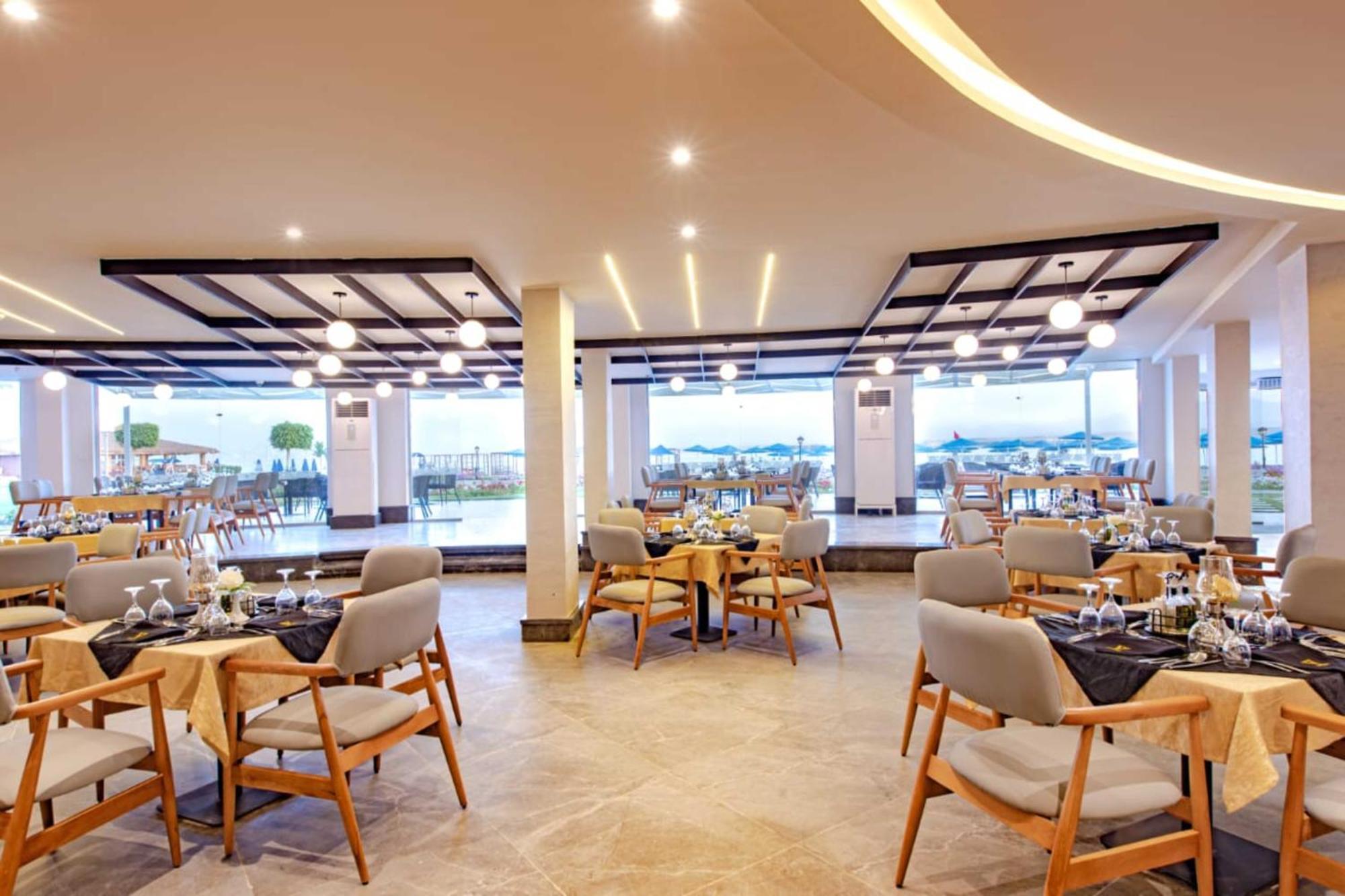 The V Luxury Resort Sahl Hasheesh ฮูร์กาดา ภายนอก รูปภาพ Restaurant